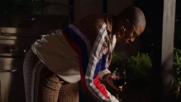 Palm Angels Leop­ard Side Stripe Pants worn by Henrietta 'Hen' Wilson (Aisha Hinds) as seen in 9-1-1 (S06E08)