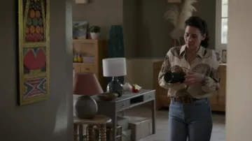 Fabienne's (Cécile Rebboah) mass-print Massimo Dutti medal-print blouse in Addict (S01E01)