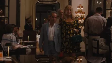 Bottega Veneta Chain Cassette Suede Crossbody Bag worn by Tanya McQuoid (Jennifer Coolidge) as seen in The White Lotus (S02E04)