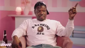 New Era Takashi Murakami 9FORTY Cap Hat Black Cloth Strap Flower Allover Japan usado por Michael Che como se ve en Ziwe (S02E07)