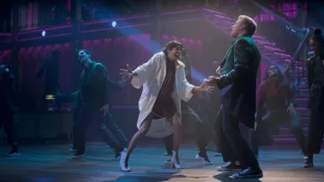 Converse Hi Top sneakers worn by Present (Will Ferrell) as seen in Spirited movie