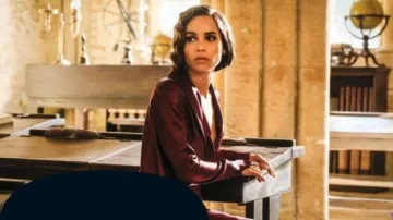 The dress with cape worn by Leta Lestrange (Zoë Kravitz) in the movie Fantastic Beasts: The Crimes of Grindelwald