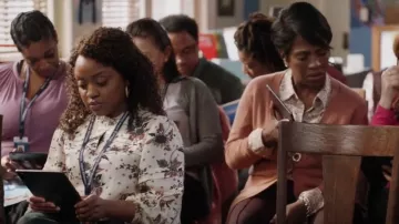 Scotch & Soda Ruf­fled Print­ed Top worn by Janine Teagues (Quinta Brunson) as seen in Abbott Elementary (S01E04)