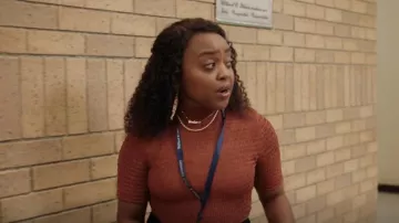 A.L.C. Synthetic Cropped Smocked Mock Neck Top worn by Janine Teagues (Quinta Brunson) as seen in Abbott Elementary (S01E06)