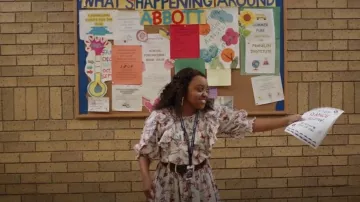 Magali Pascal Manon Floral Puff-Sleeved Midi Dress worn by Janine Teagues (Quinta Brunson) as seen in Abbott Elementary (S01E09)