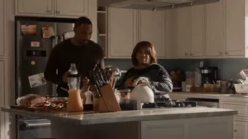 Karen Scott Floral Trim Boatneck Top worn by Dr. Miranda Bailey (Chandra Wilson) as seen in Station 19 (S05E13)