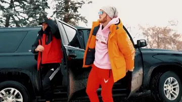 Orange Supreme Jacket worn by Logan Paul as seen in Eart is Flat music video by Flat Boyz