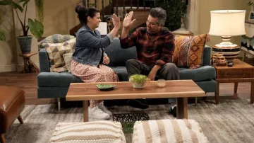 Nike whites sneakers worn by Mayan (Mayan Lopez) as seen in Lopez vs. Lopez (S01E04)