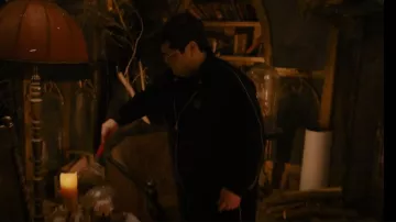 Ellesse Vis Metal­lic Lo­go Velour Track Top in Black worn by Guillermo de la Cruz (Harvey Guillen) as seen in What We Do in the Shadows (S04E07)