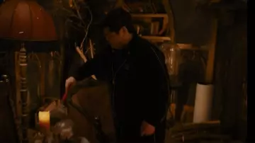 Ellesse Vis Metal­lic Lo­go Velour Track Top in Black worn by Guillermo de la Cruz (Harvey Guillen) as seen in What We Do in the Shadows (S04E07)