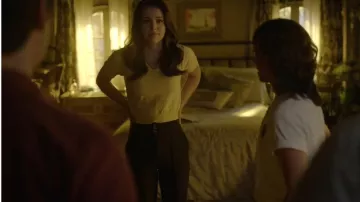 Express High Waisted Gold Button Ribbed Flare Pant worn by Josie Saltzman (Kaylee Bryant) as seen in Legacies (S04E04)