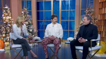 Bode Floral Corduroy Trousers worn by Lucas Bravo as seen in Good Morning America on December 15, 2022