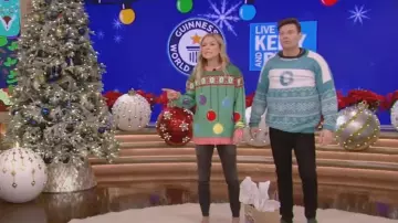 Tipsy Elves Naughty or Nice Ugly Christmas Sweater worn by Ryan Seacrest as  seen in LIVE with Kelly and Ryan on December 16, 2022