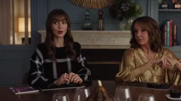 Stella McCartney Win­dow­pane Check Print Sweat­shirt worn by Emily Cooper (Lily Collins) as seen in Emily in Paris (S03E10)