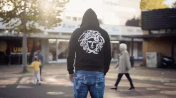 The black Versace hoodie worn by Sdans his Charbonneur music video