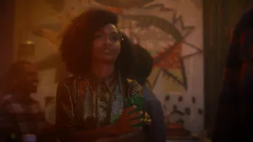 Victoria Beckham Bib Front Metallic Striped Tie Neck Blouse worn by Zoey Johnson (Yara Shahidi) as seen in grown-ish (S04E05)