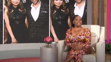 Ganni Ruched Floral-print silk-blend Midi Dress worn by Sherri Shepherd as seen in Sherri on  November 16, 2022