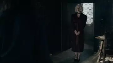 The burgundy blouse worn by Queenie Goldstein (Alison Sudol) in the movie Fantastic Beasts - Dumbledore's Secrets