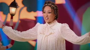 Zimmermann Metal­lic Pol­ka-Dot Tie Blouse worn by Tamera Mowry as seen in Dr. Seuss Baking Challenge (S01E05)