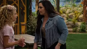 Free People After Hours Fringe Denim Jacket worn by Lou Hockhauser (Miranda May) as seen in BUNK'D (S05E05)