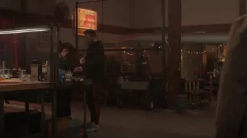 Fred Perry Laurel Wreath Back Print Hoodie In Black worn by Bob Goodwin (Jai Courtney) as seen in Kaleidoscope (S01E01)