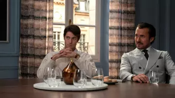 Cartier Tank Watch worn by Gabriel (Lucas Bravo) as seen in Emily in Paris TV series outfits (Season 3)
