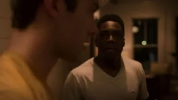 Lacoste V Neck Pi­ma Men's T-Shirt worn by Kelce (Deion Smith) as seen in Outer Banks (S01E09)