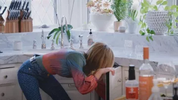 Versace La Greca Monogram Slim Leg Jeans worn by Angie Harrington as seen in The Real Housewives of Salt Lake City (S03E13)