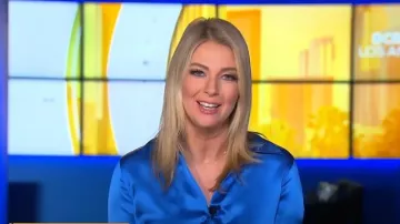 L'Agence Dani Blouse in Palace Blue worn by Evelyn Taft as seen in CBS Mornings on January 12, 2023