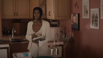 Helmut Lang Ribbed Boucle Cardigan worn by Hilary Banks (Coco Jones) as seen in Bel-Air (S01E05)