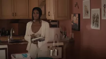 Helmut Lang Ribbed Boucle Flare Pants worn by Hilary Banks (Coco Jones) as seen in Bel-Air (S01E05)