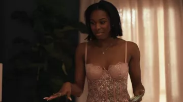 Victorias Secret Allure Shimmer Bustier With Garters worn by Hilary Banks (Coco Jones) as seen in Bel-Air (S01E10)