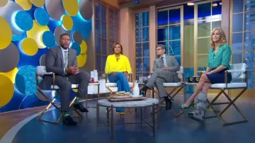 Michael Kors High-Waisted Flared Trousers worn by Robin Roberts as seen in Good Morning America on January 27, 2023