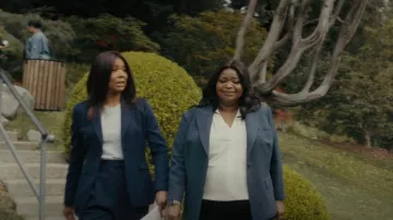 Calvin Klein Pleated V-Neck Crepe Top worn by Poppy Scoville-Parnell (Octavia Spencer) as seen in Truth Be Told (S03E01)