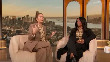 Burberry Jane Wide Tailored Wool Pants worn by Drew Barrymore as seen in The Drew Barrymore Show on January 27, 2023