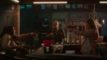 Saint Laurent Envelope Crossbody Bag worn by Micah Keith (Kate Hudson) as seen in Truth Be Told (S02E01)