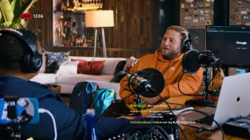 Champion hoodie in orange worn by Ezra (Jonah Hill) as seen in You People