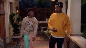 Zara skull printed crewneck worn by Kelvin Upshaw (Diamond Lyons) as seen in The Upshaws (S03E05)