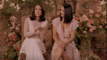 Marchesa Notte Bridesmaids Ruf­fled Wrap Gown worn by Nikki Bella as seen in Nikki Bella Says I Do (S01E02)