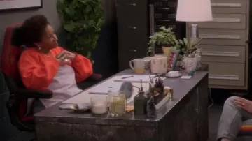 Ganni Soft­ware Wave Isoli Colour-Block Sweatshirt worn by Lucretia Turner (Wanda Sykes) as seen in The Upshaws (S03E02)