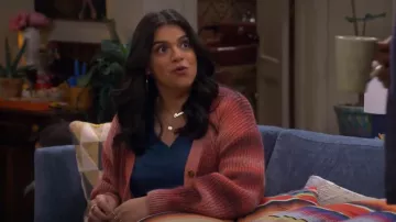 Scotch & Soda Knit­ted Puffy Sleeve Cardi­gan worn by Mayan (Mayan Lopez) as seen in Lopez vs. Lopez (S01E12)