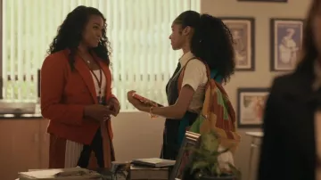 Ba & Sh Donie Pleated Graphic Midi-Skirt worn by Ms. Hughes (Tatyana Ali) as seen in Bel-Air (S02E01)