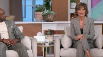 L'Agence Logan Houndstooth Trousers worn by Lisa Rinna as seen in The Talk on February 24, 2023