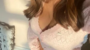 For Love & Lemons Knit Gardigan cropped baby pink worn by Zahia Dehar on her Instagram