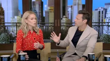 Tipsy Elves Naughty or Nice Ugly Christmas Sweater worn by Ryan Seacrest as  seen in LIVE with Kelly and Ryan on December 16, 2022