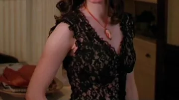 The black lace top worn by Paige Matthews (Rose McGowan) in the Charmed series (S04E13)