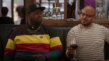 Cross Colours Multistripe Cotton Rugby Shirt worn by Sherm Jones (Carl Tart) as seen in Grand Crew (S01E09)