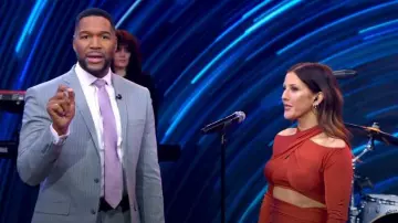 Lapointe Satin-fin­ish Cut-out Wrap Top worn by Ellie Goulding as seen in Good Morning America on March 16, 2023