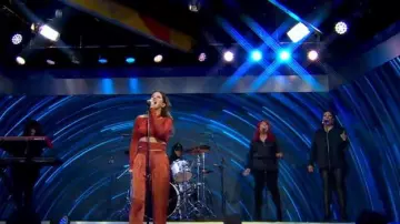 Lapointe Low-Rise Satin-Finish Trousers worn by Ellie Goulding as seen in Good Morning America on March 16, 2023