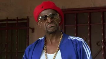 Kangol red hat worn by Old School (Antonio Fargas) as seen in Don't Be a Menace to South Central While Drinking Your Juice in the Hood